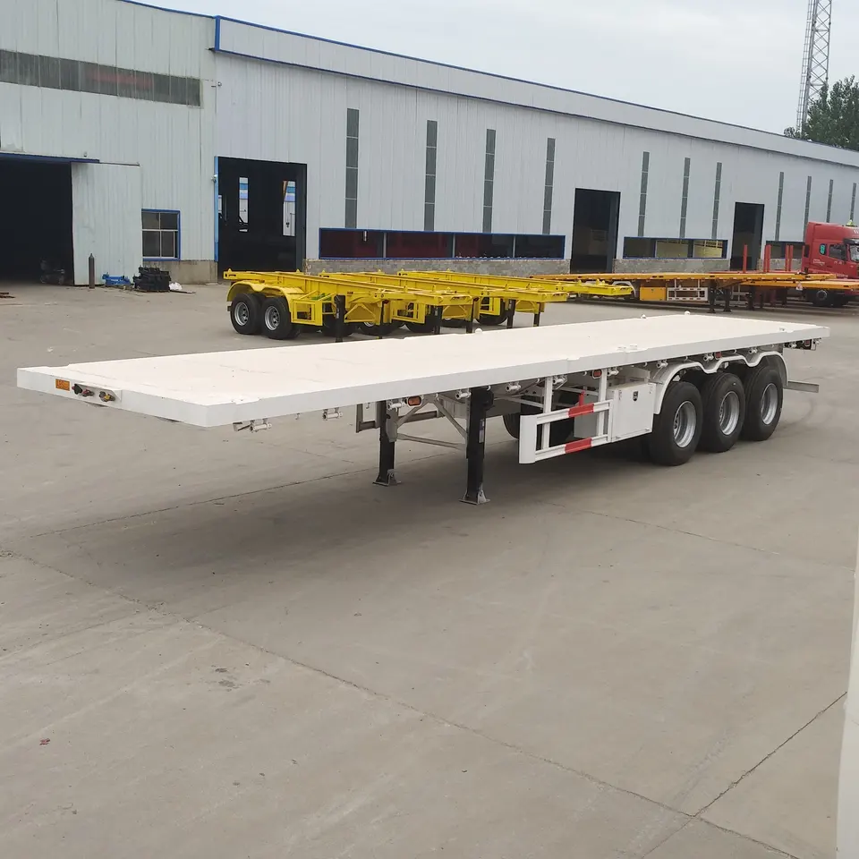 H104fc6c2da4c4209b7b154dba202ee37m.jpg_960x960 (2) 3 Axle Transport 20ft 40ft Container Flatbed Semi Trailer For Sale - Image 1